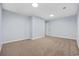 Carpeted room with ample space, light blue walls and recessed lighting at 854 Falkirk St., Myrtle Beach, SC 29579