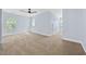 Carpeted room with two bright windows, a unique round window and closet at 854 Falkirk St., Myrtle Beach, SC 29579