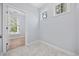 Bright bedroom with a view features neutral paint, tile floors, and two sunny windows at 854 Falkirk St., Myrtle Beach, SC 29579