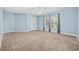 Spacious bedroom with neutral carpet, a ceiling fan and two large windows at 854 Falkirk St., Myrtle Beach, SC 29579