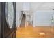 Inviting foyer with hardwood floors, a staircase, and an open floor plan to the living areas at 854 Falkirk St., Myrtle Beach, SC 29579