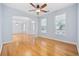 Bright living room with hardwood floors, arched doorway and large windows at 854 Falkirk St., Myrtle Beach, SC 29579