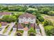 Aerial view of a large luxury house, surrounded by beautiful greenery and a golf course at 8546 San Marcello Dr. # 1-102, Myrtle Beach, SC 29579