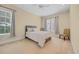 Inviting bedroom with neutral tones, abundant natural light, and plush carpeting, perfect for relaxation at 8546 San Marcello Dr. # 1-102, Myrtle Beach, SC 29579