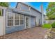 The backyard features brick pavers, mature landscaping, and access to the home at 934 Tiffany Ln., North Myrtle Beach, SC 29582