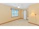 Bedroom featuring a large window and neutral carpet at 934 Tiffany Ln., North Myrtle Beach, SC 29582
