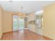 Dining area with hardwood floors, chandelier, and French doors to the patio at 934 Tiffany Ln., North Myrtle Beach, SC 29582
