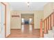 Inviting foyer leading to a living area with a fireplace and staircase to the upper level at 934 Tiffany Ln., North Myrtle Beach, SC 29582