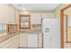 Kitchen featuring granite countertops, white cabinets, and tile backsplash at 934 Tiffany Ln., North Myrtle Beach, SC 29582