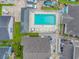 Aerial view of a community pool with lounge chairs and tables for residents at 934 Tiffany Ln., North Myrtle Beach, SC 29582
