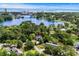 Breathtaking aerial shot showcases the beautiful house near a lake and golf course, with ocean views at 9340 Lake Dr., Myrtle Beach, SC 29572