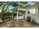 Backyard patio featuring a hot tub under a pergola at 9340 Lake Dr., Myrtle Beach, SC 29572