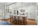 Bright, eat-in kitchen featuring a large island, stainless steel appliances, and hardwood floors at 9340 Lake Dr., Myrtle Beach, SC 29572