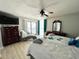Comfortable bedroom with a ceiling fan and balcony access, and a view of the ocean at 9500 Shore Dr. # 17B, Myrtle Beach, SC 29572