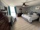Serene bedroom with a king-size bed, ample storage, and lots of natural light at 9500 Shore Dr. # 17B, Myrtle Beach, SC 29572