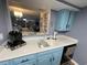 Charming kitchen with bright cabinets, sleek countertops, and stainless steel sink at 9500 Shore Dr. # 17B, Myrtle Beach, SC 29572