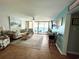 Open living room with ocean view, comfortable seating, and a coastal aesthetic at 9500 Shore Dr. # 17B, Myrtle Beach, SC 29572