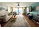 Bright living room with ocean view and sliding glass doors to the balcony at 9500 Shore Dr. # 17B, Myrtle Beach, SC 29572