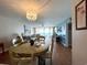 Inviting living space with ocean views visible from the dining area at 9500 Shore Dr. # 17B, Myrtle Beach, SC 29572