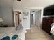 Bright main bedroom with light floors, ensuite bathroom, and walk-in closet at 9500 Shore Dr. # 17B, Myrtle Beach, SC 29572