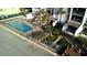 Stunning aerial view of a sparkling pool, beach access and lush landscaping that offers serenity at 9500 Shore Dr. # 17B, Myrtle Beach, SC 29572