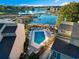 This aerial view highlights a community pool nestled among landscaped buildings, offering recreational charm at 9551 Edgerton Dr. # C-6, Myrtle Beach, SC 29572