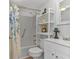 Clean, well-lit bathroom featuring a shower, sink and shelves at 9551 Edgerton Dr. # C-6, Myrtle Beach, SC 29572