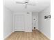 Simple bedroom with laminate flooring and ceiling fan at 9551 Edgerton Dr. # C-6, Myrtle Beach, SC 29572