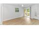 Bedroom leading to balcony with laminate flooring at 9551 Edgerton Dr. # C-6, Myrtle Beach, SC 29572