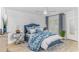 Serene bedroom with stylish bedding, ample natural light, and modern accents at 9551 Edgerton Dr. # C-6, Myrtle Beach, SC 29572