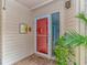 Cozy entryway with 'Welcome' mat and decorative wall hangings, complemented by vibrant greenery at 9551 Edgerton Dr. # C-6, Myrtle Beach, SC 29572