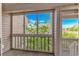 Bright patio with fresh air that offers a serene outdoor space with views of lush trees and clear blue skies at 9551 Edgerton Dr. # C-6, Myrtle Beach, SC 29572
