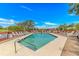 Inviting pool area with lounge chairs, perfect for relaxation and enjoying the beautiful sunny weather at 9551 Edgerton Dr. # C-6, Myrtle Beach, SC 29572