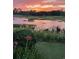 This scenic view offers golf course views over the water and landscaping at 9551 Edgerton Dr. # C-6, Myrtle Beach, SC 29572