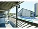 Comfortable balcony with seating area overlooking the pool and community areas at 9621 Shore Dr. # F-117, Myrtle Beach, SC 29572