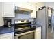 Kitchen featuring stainless steel appliances and light blue countertops at 9621 Shore Dr. # F-117, Myrtle Beach, SC 29572