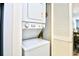 Convenient laundry area with stacked washer and dryer units at 9621 Shore Dr. # F-117, Myrtle Beach, SC 29572