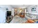 Open-concept living space with a comfortable seating area, a dining area, and modern decor at 9621 Shore Dr. # F-117, Myrtle Beach, SC 29572
