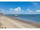 Scenic aerial view of the beach and pier with sandy shores and blue ocean at 9661 Shore Dr. # B-3, Myrtle Beach, SC 29572