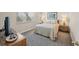 Comfortable bedroom with neutral color scheme, soft carpeting, side tables and natural light creates a soothing atmosphere at 9661 Shore Dr. # B-3, Myrtle Beach, SC 29572
