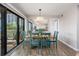 Bright dining area with table, chairs, and sliding glass doors leading to a balcony with a beautiful view at 9661 Shore Dr. # B-3, Myrtle Beach, SC 29572