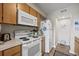 Efficient kitchen space with updated appliances and great lighting, perfect for cooking and meal preparation at 9661 Shore Dr. # B-3, Myrtle Beach, SC 29572