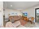 Comfortable living room features a cozy sofa, stylish decor, and access to a balcony with a view at 9661 Shore Dr. # B-3, Myrtle Beach, SC 29572