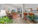 Cozy living room features a comfortable sofa, stylish decor, and sliding glass doors to a balcony with a view at 9661 Shore Dr. # B-3, Myrtle Beach, SC 29572