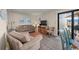 Inviting living room featuring neutral tones, plush seating, and a balcony offering a relaxing space to unwind at 9661 Shore Dr. # B-3, Myrtle Beach, SC 29572