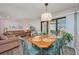 Inviting living space flows seamlessly to dining area, creating an open and airy atmosphere perfect for relaxation at 9661 Shore Dr. # B-3, Myrtle Beach, SC 29572