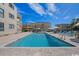 Beautiful pool surrounded by brick pavers and lounge chairs on a sunny day at 9661 Shore Dr. # B-3, Myrtle Beach, SC 29572
