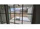 View of the screened in porch with concrete flooring and view to the yard at Tbd 81 Persimmon Rd., Aynor, SC 29511
