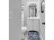 Bathroom featuring a vanity with storage, a toilet, and a light fixture at 1100 Possum Trot Rd. # D-205, North Myrtle Beach, SC 29582