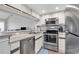 Kitchen showcases stainless steel appliances, ample counter space, and modern fixtures at 1100 Possum Trot Rd. # D-205, North Myrtle Beach, SC 29582